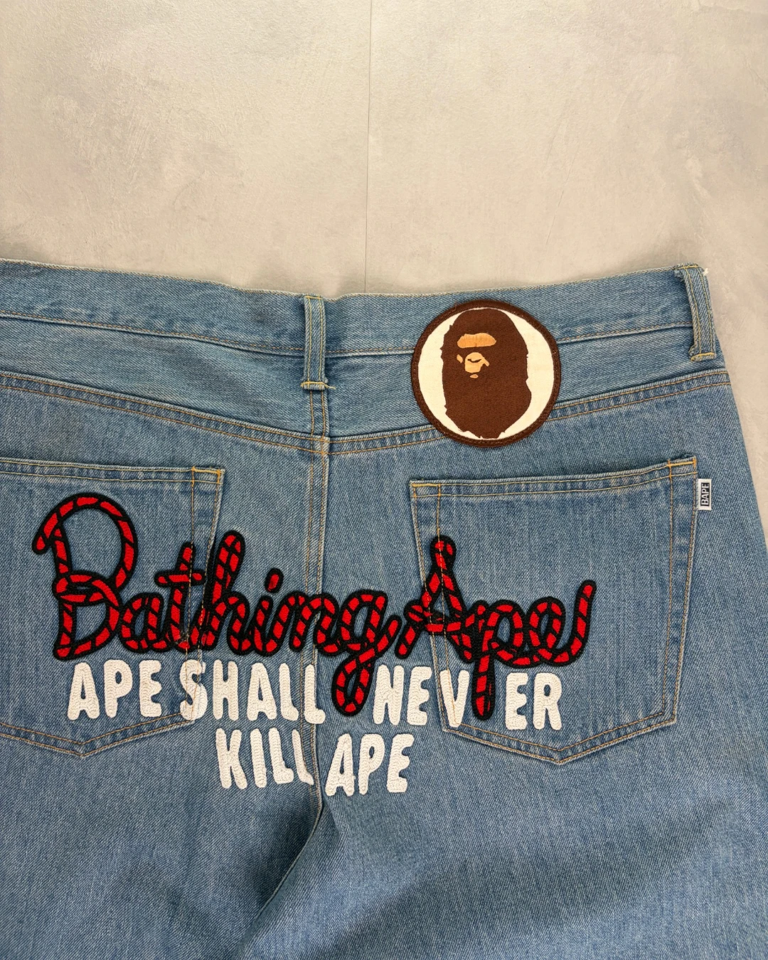 Bape Spell Out Back Embroidery Washed Jeans light blue – XXL