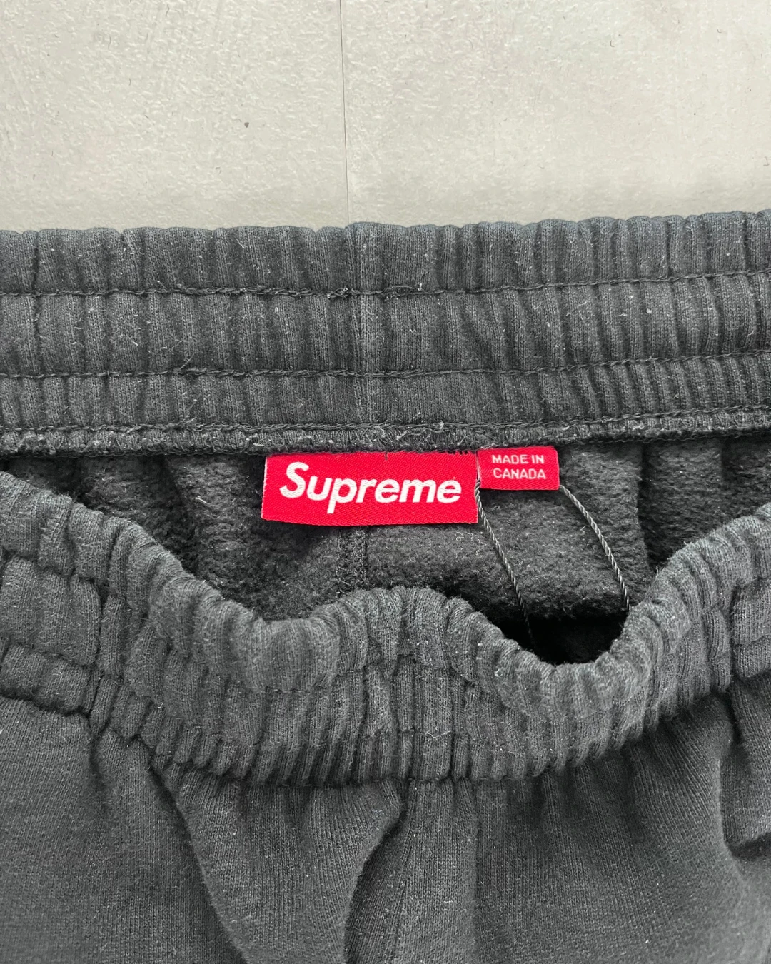 Supreme $ Sign Bottoms black – L
