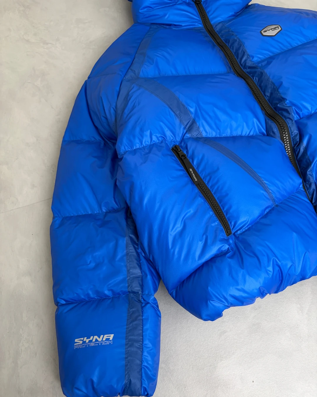 SynaWorld Translucent Puffer Jacket blue – (NEW)