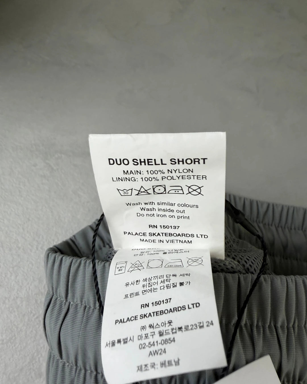 Palace Duo Shell Shorts orange|grey - M