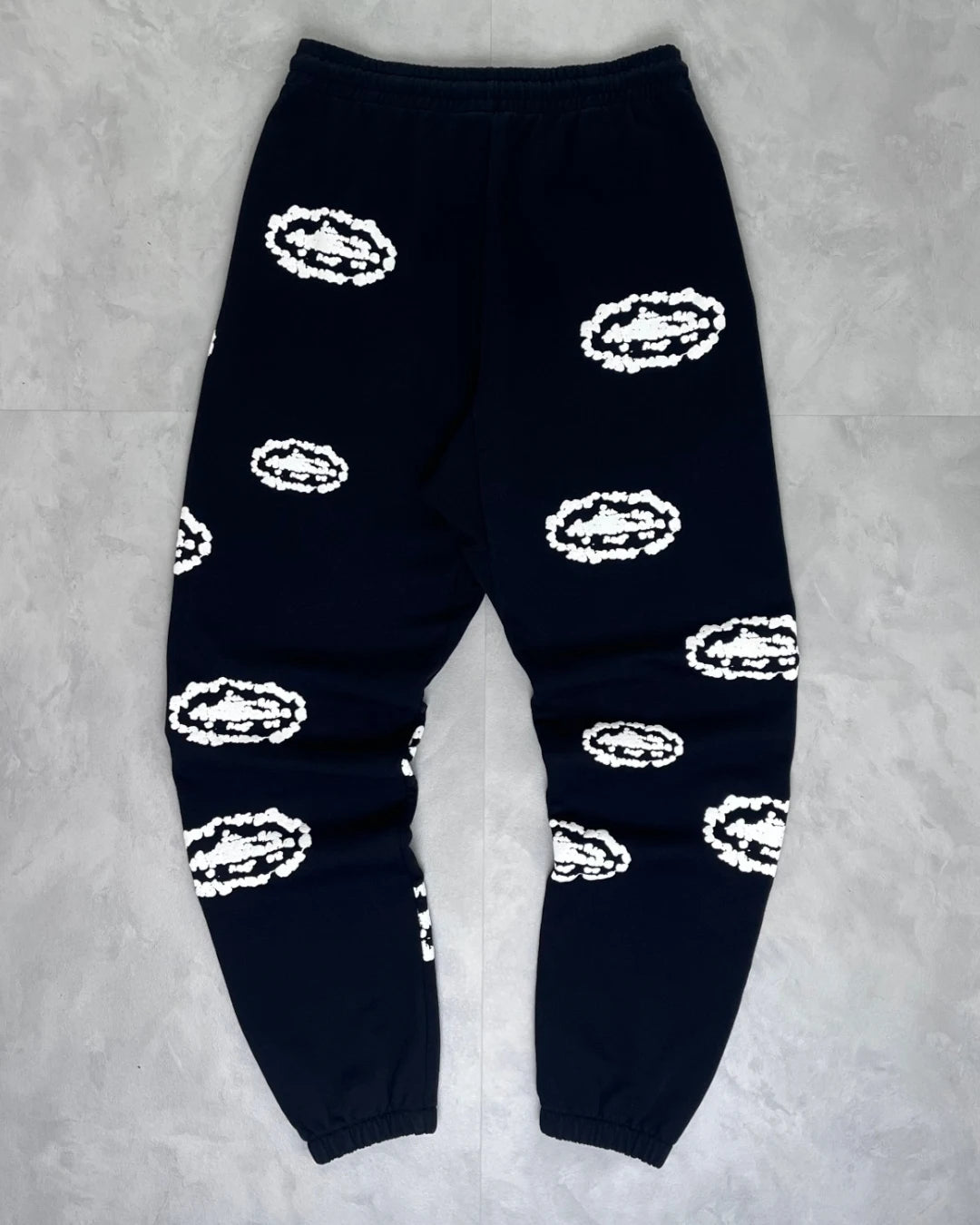 Corteiz X Denim Tears Cotton Wreath Bottoms black – M